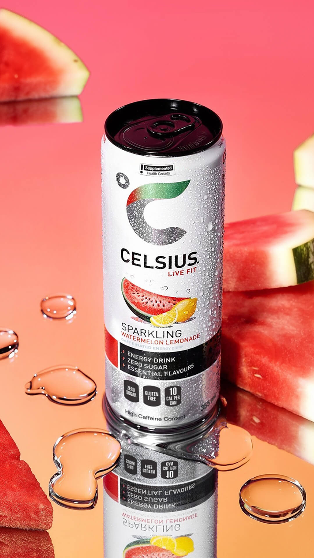 A can of cold watermelon juice on a table, surrounded by sliced watermelons.