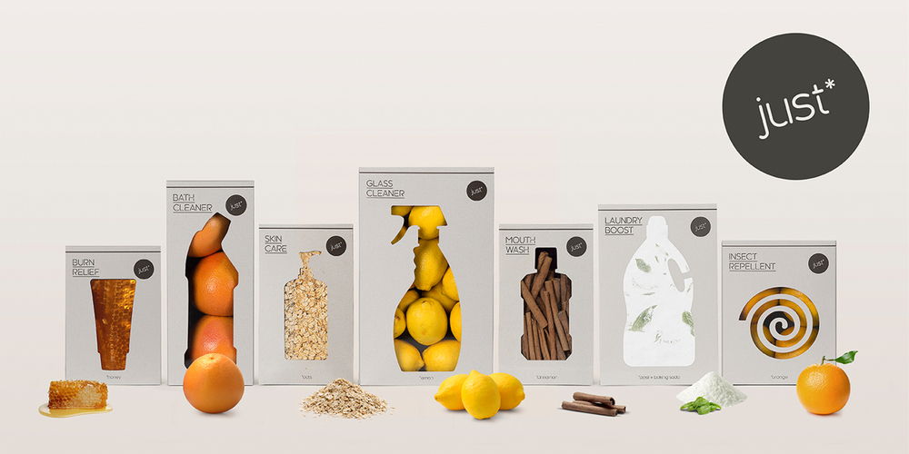A collection of six packages of food items, including fruits and nuts, displayed on a white surface.