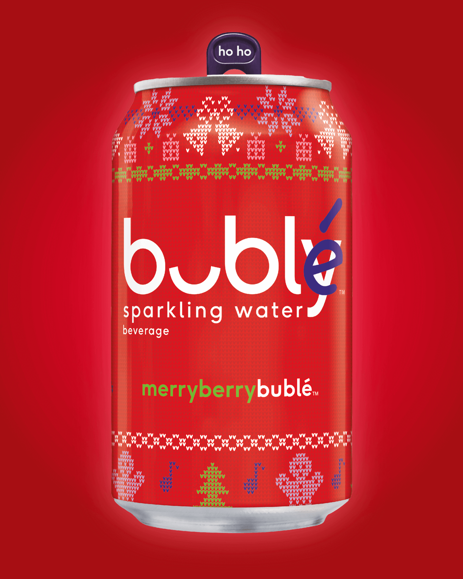 Red soda can with white lettering, featuring a holiday design.