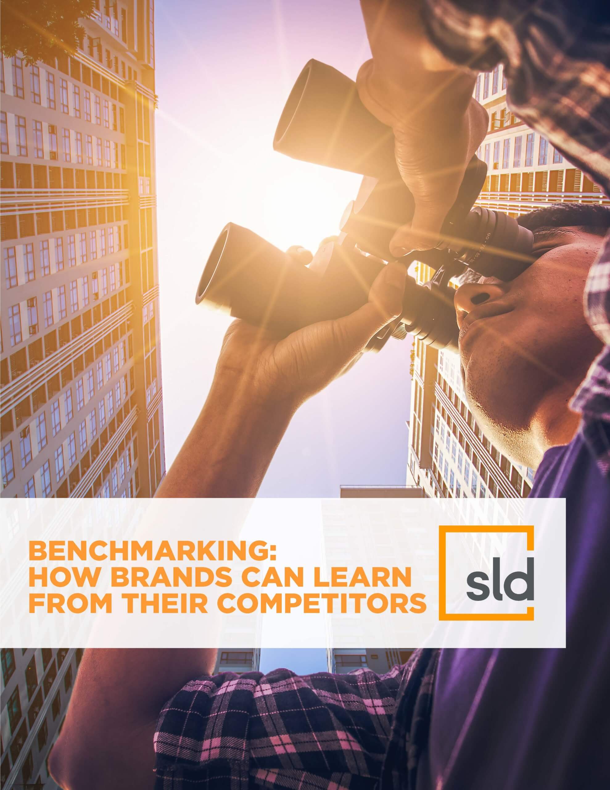 A person taking a photo through binoculars, with the focus on a benchmarking study about how brands can learn from their competitors.