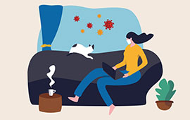 Women sitting on couch with laptop and cat