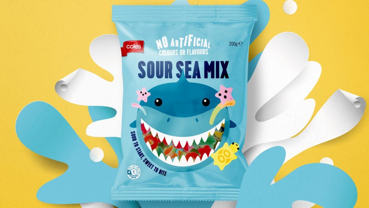 A bag of sour sea mix candy on a yellow background, with blue splashes around it.