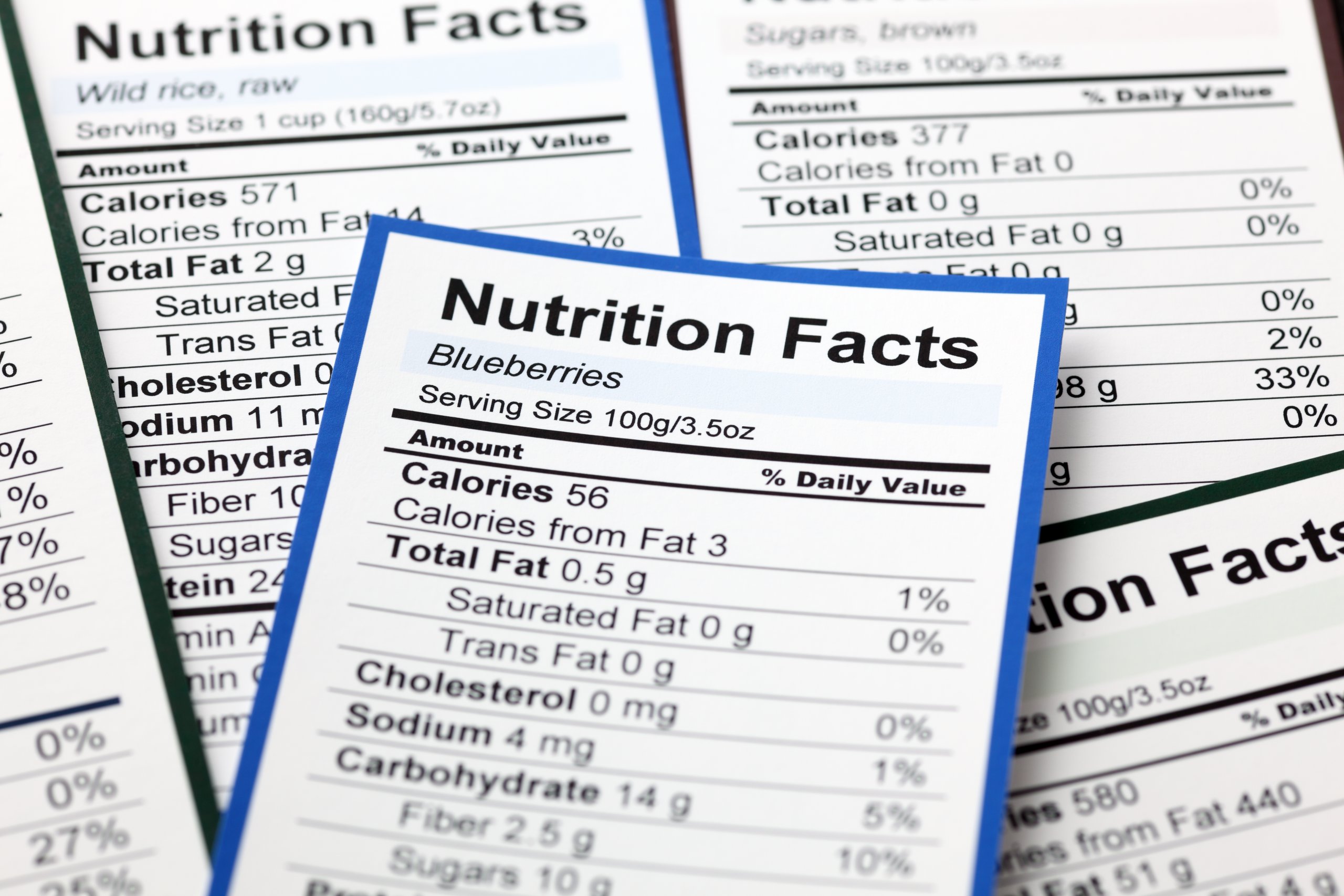 Three nutrition facts labels, each listing ingredients and nutritional information.