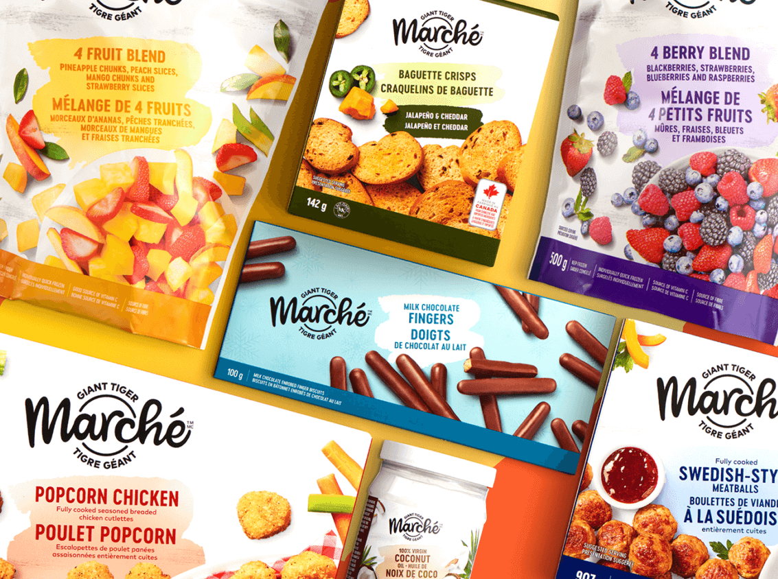 A collection of six colorful bags of snacks, each labeled with the name of the product and ingredients, displayed on a table.