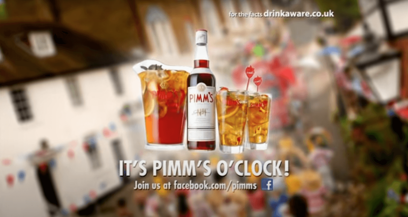 Advertisement for Pimm's cocktails, featuring a glass of Pimm's and two straws.
