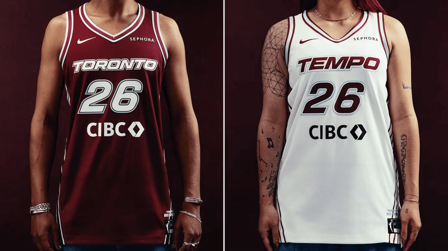 Two basketball jerseys, one red and white, the other white and red, displayed side by side.