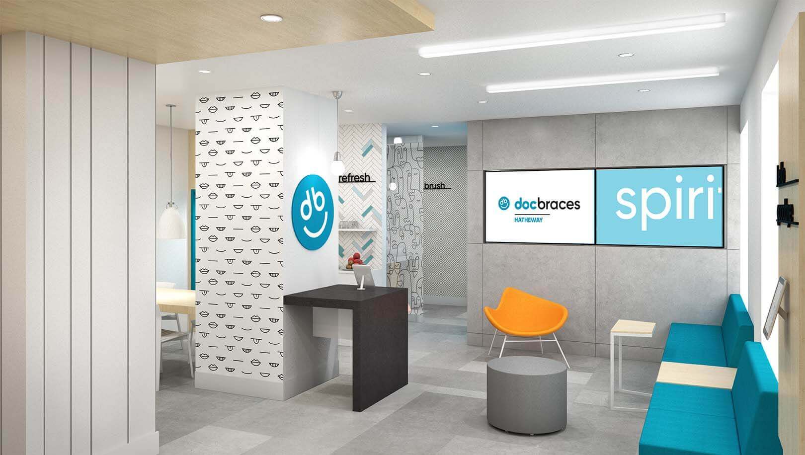 A modern office lobby with a sign that reads