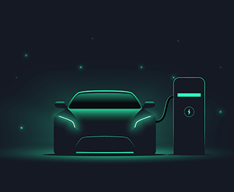 Electric car charging at night under neon lights.